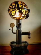 Steampunk Art floor lamp: Decorative piece of art with skulls and flowers.